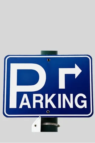 Blue rectangular parking sign with rounded corners, featuring a large white “P,” the word “PARKING,” and a white right-pointing arrow, mounted on a green pole.
