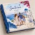 Custom hardcover family travel photo book featuring a Santorini, Greece holiday cover.