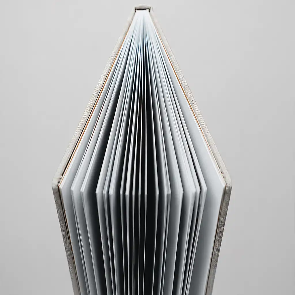 photobook-inner Top view of a hardcover photo book showing its thick, professionally bound inner pages.