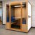 Wecare QuietSpace Quad 4-person office meeting pod with acoustic enclosure and built-in table for private office discussions.