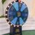 LED spin the prize wheel with Amaar Jewels branding placed at an outdoor venue, featuring illuminated lights, promotional prize segments, and a sturdy display stand for events and activations.
