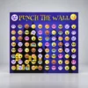 Halloween Punch the Wall backdrop with colourful monster and emoji graphics on a purple haunted-house background