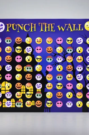 Halloween Punch the Wall backdrop with colourful monster and emoji graphics on a purple haunted-house background