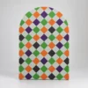 Halloween arch backdrop with an orange, green, purple, black and white harlequin diamond pattern